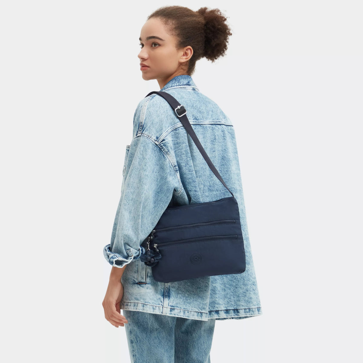 Navy blue nylon crossbody bag with multiple zippered pocket