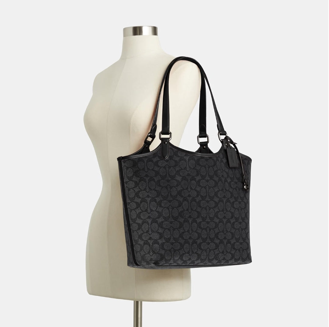 monogram tote bag featuring dual shoulder straps